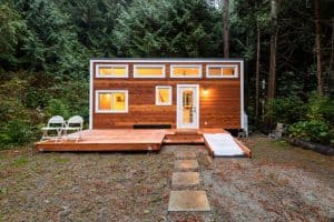 What should be considered before building or buying a tiny house